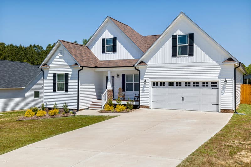Pressure-washed residential driveway with stains and grime removed